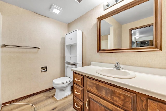 5073 Scottie Ct, New Franken, WI 54229 - bathroom with wood finished floors, vanity, and toilet
