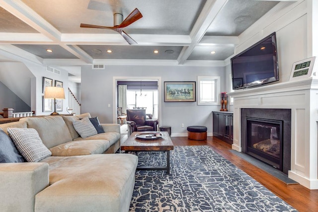 6663 S Chickahauk Trl, Middleton, WI 53562 - living area with coffered ceiling, a ceiling fan, stairs, wood finished floors, and beam ceiling