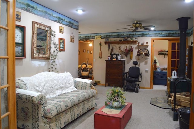 4878N Fur Farm Trl, Winter, WI 54896 - living room featuring a ceiling fan, carpet flooring, and baseboards