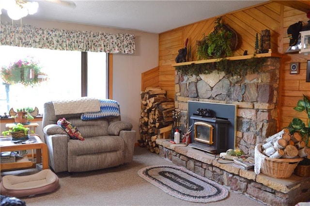 4878N Fur Farm Trl, Winter, WI 54896 - carpeted living room featuring plenty of natural light, wooden walls, and ceiling fan