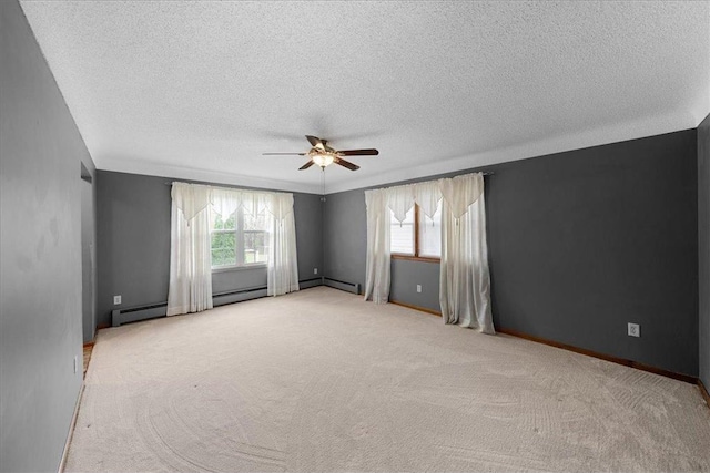 1365 Woodbridge St, Saint Paul, MN 55117 - empty room with plenty of natural light, a textured ceiling, ceiling fan, light carpet, and baseboards