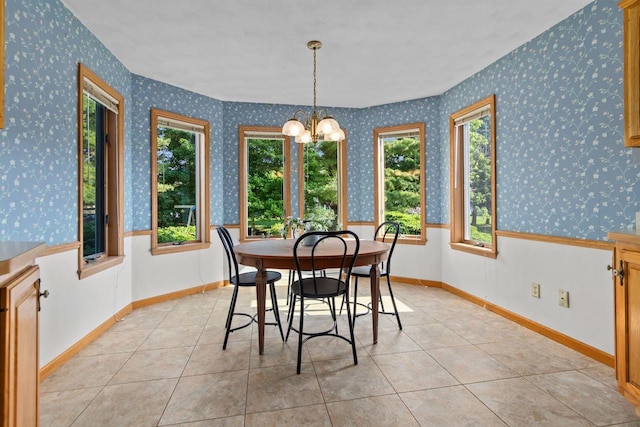 146 Old Orchard Ln, Neenah, WI 54956 - dining space featuring a chandelier, light tile patterned floors, and wallpapered walls