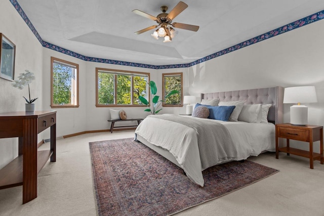 146 Old Orchard Ln, Neenah, WI 54956 - bedroom with light carpet, a raised ceiling, baseboards, and a ceiling fan