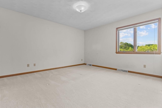 146 Old Orchard Ln, Neenah, WI 54956 - unfurnished room featuring baseboards and light carpet
