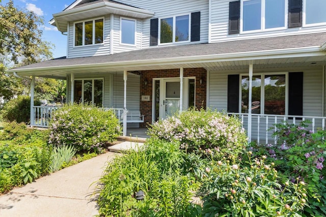 146 Old Orchard Ln, Neenah, WI 54956 - view of front of house featuring a porch and brick siding
