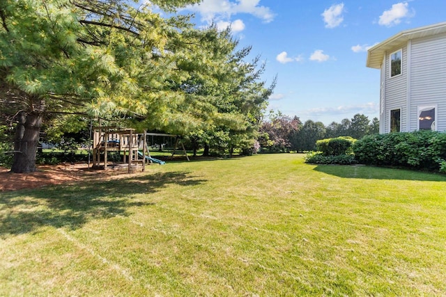 146 Old Orchard Ln, Neenah, WI 54956 - view of green lawn featuring a playground