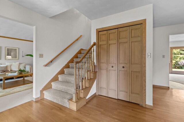 146 Old Orchard Ln, Neenah, WI 54956 - staircase featuring wood finished floors and baseboards