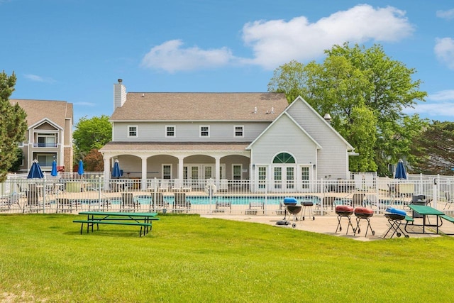 809 Harbor House Dr Unit 4, Madison, WI 53719 - rear view of house featuring a patio area and a chimney