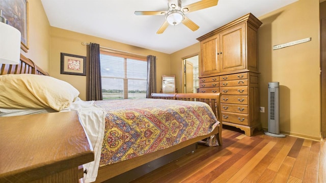 N6464 Canterbury Dr, Fond Du Lac, WI 54937 - bedroom with wood finished floors, baseboards, and ceiling fan