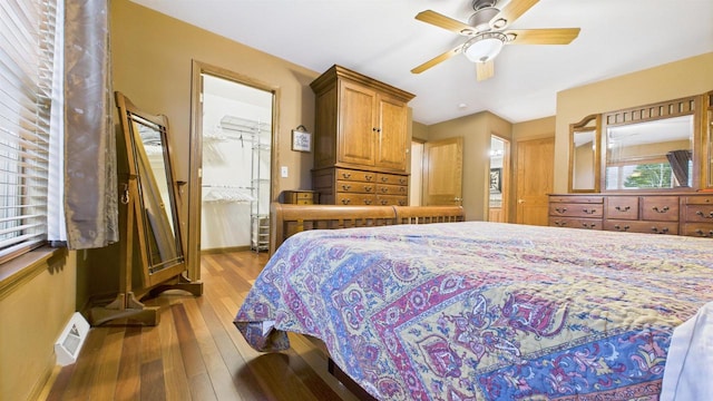 N6464 Canterbury Dr, Fond Du Lac, WI 54937 - bedroom featuring hardwood / wood-style floors, baseboards, a ceiling fan, and ensuite bathroom