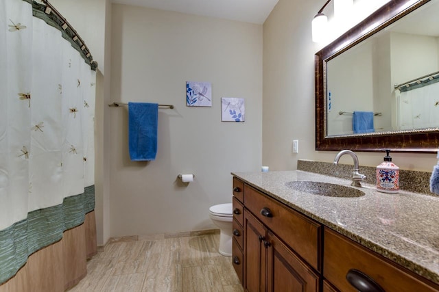 392 Campbell Hill Ct, Deforest, WI 53532 - full bath featuring vanity, toilet, baseboards, and a shower with shower curtain