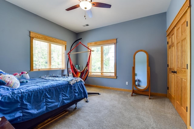 392 Campbell Hill Ct, Deforest, WI 53532 - carpeted bedroom with baseboards and a ceiling fan