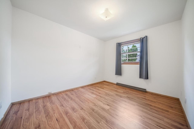 1500 E Lindbergh St, Appleton, WI 54911 - spare room featuring wood finished floors and baseboards