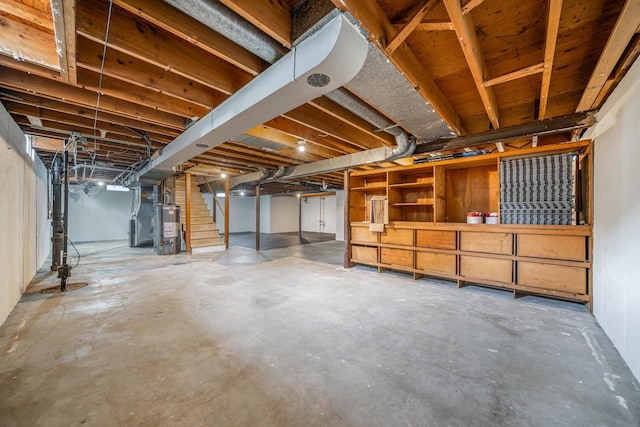 1500 E Lindbergh St, Appleton, WI 54911 - unfinished basement featuring stairs and gas water heater