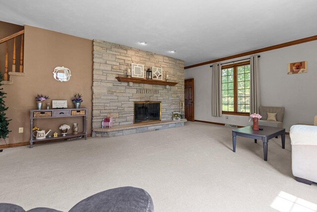 3544 Windsong Ter, Oshkosh, WI 54904 - carpeted living area featuring ornamental molding, a stone fireplace, baseboards, and stairway