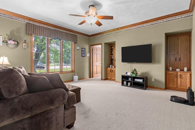 3544 Windsong Ter, Oshkosh, WI 54904 - living area with ceiling fan, carpet floors, baseboards, and crown molding