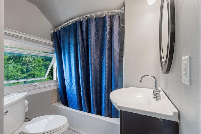1212 N Leminwah St, Appleton, WI 54911 - full bathroom featuring lofted ceiling, toilet, shower / bathtub combination with curtain, and vanity