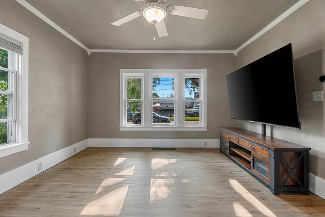 1212 N Leminwah St, Appleton, WI 54911 - unfurnished living room featuring crown molding, wood finished floors, a ceiling fan, and baseboards