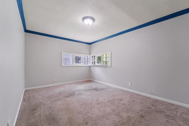 N7618 County Road C, Eldorado, WI 54932 - empty room featuring carpet floors, crown molding, and baseboards