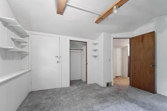 N7618 County Road C, Eldorado, WI 54932 - unfurnished bedroom with carpet floors, vaulted ceiling, a ceiling fan, and a closet