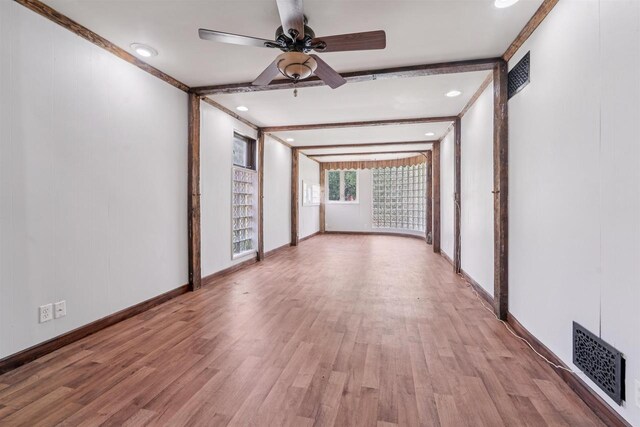 N7618 County Road C, Eldorado, WI 54932 - empty room featuring light wood-type flooring, baseboards, a ceiling fan, beamed ceiling, and recessed lighting