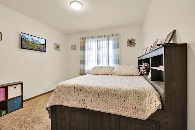 2020 Meadow Ct Unit 2, West Bend, WI 53095 - bedroom with carpet flooring and baseboards