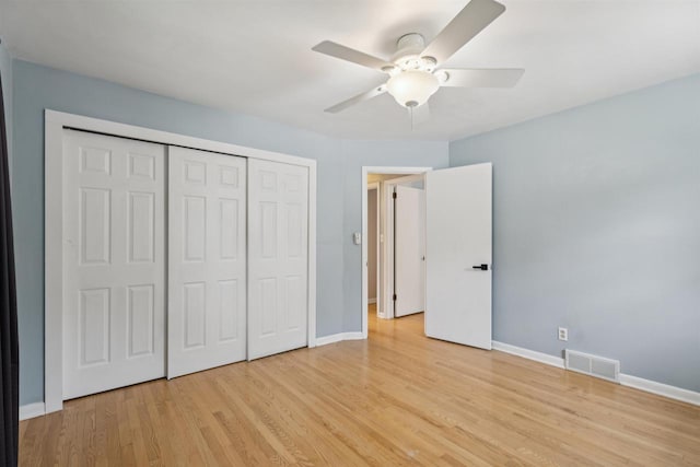 476 Taft St, Fond Du Lac, WI 54935 - unfurnished bedroom featuring light wood-style flooring, baseboards, a closet, and a ceiling fan