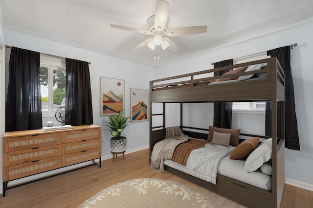 476 Taft St, Fond Du Lac, WI 54935 - bedroom with light wood-style floors, baseboards, and a ceiling fan