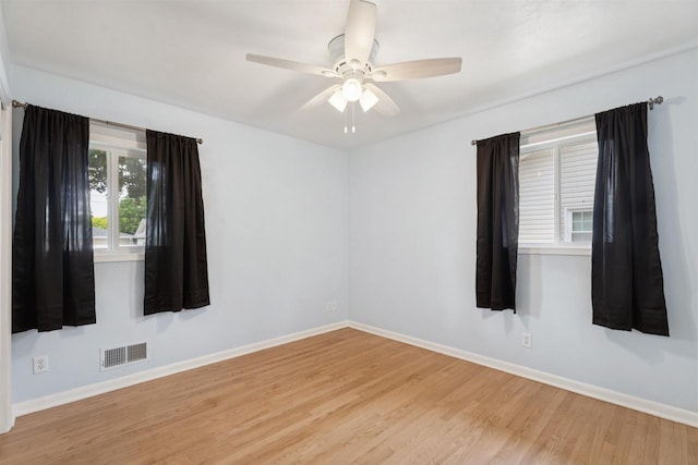 476 Taft St, Fond Du Lac, WI 54935 - unfurnished room featuring wood finished floors, baseboards, and ceiling fan