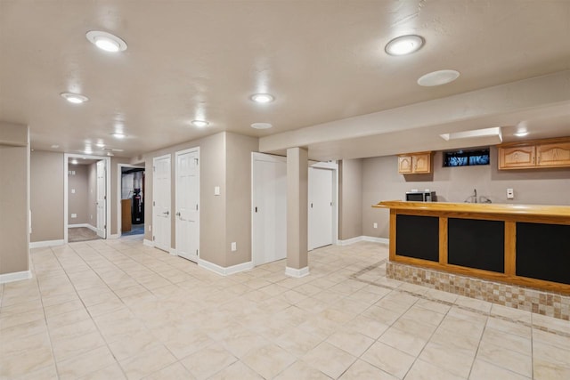 476 Taft St, Fond Du Lac, WI 54935 - kitchen featuring baseboards, light tile patterned floors, recessed lighting, and a sink