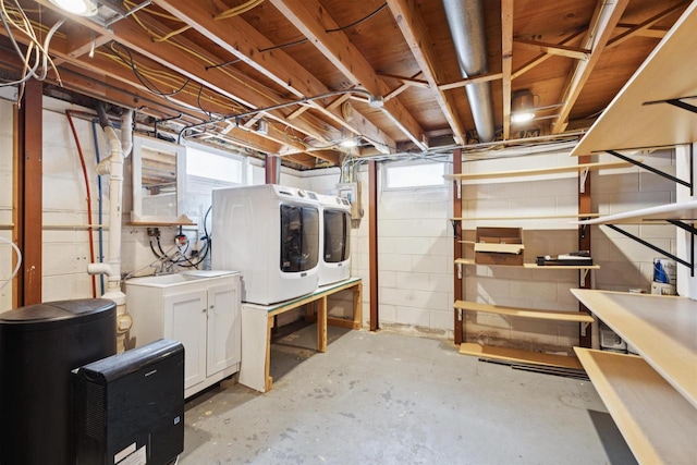 476 Taft St, Fond Du Lac, WI 54935 - below grade area featuring separate washer and dryer and concrete block wall
