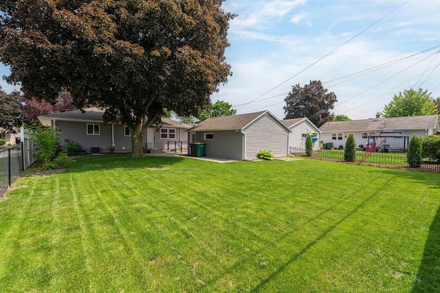 476 Taft St, Fond Du Lac, WI 54935 - view of yard featuring an outdoor structure and central AC