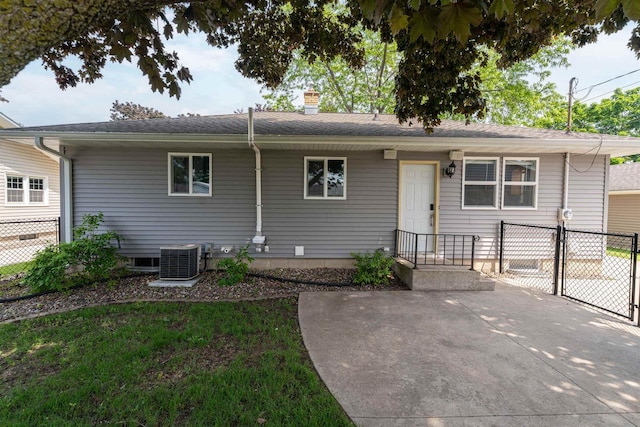 476 Taft St, Fond Du Lac, WI 54935 - back of property featuring central air condition unit and a chimney