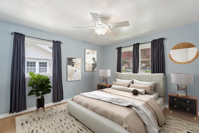 476 Taft St, Fond Du Lac, WI 54935 - bedroom with wood finished floors, baseboards, and a ceiling fan