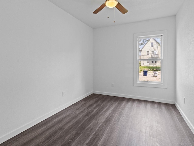 2544 N 35th St Unit 2546, Milwaukee, WI 53210 - spare room with dark wood-style floors, ceiling fan, and baseboards