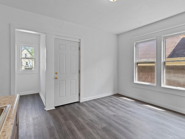 2544 N 35th St Unit 2546, Milwaukee, WI 53210 - foyer entrance featuring dark wood finished floors and baseboards