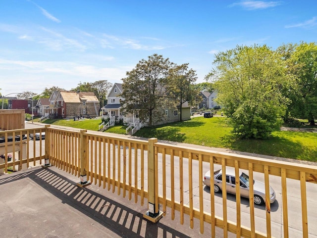 2544 N 35th St Unit 2546, Milwaukee, WI 53210 - wooden deck with a residential view and a lawn