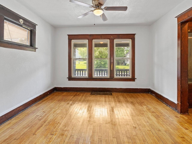 2544 N 35th St Unit 2546, Milwaukee, WI 53210 - unfurnished room with baseboards, hardwood / wood-style flooring, and ceiling fan