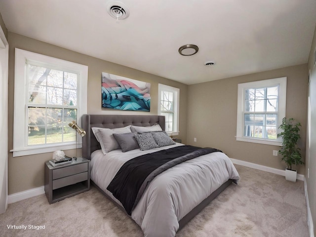 8428 Fox River Rd, Waterford, WI 53185 - bedroom featuring light colored carpet and baseboards