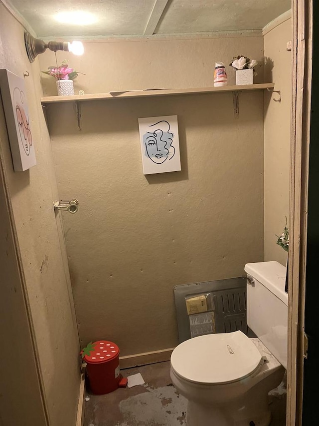 823 N Main St, Marion, WI 54950 - bathroom featuring toilet and unfinished concrete floors