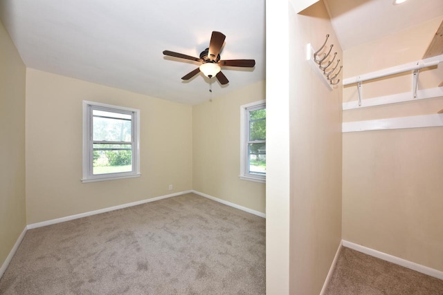 3825 S 5th St Unit 3823, Milwaukee, WI 53207 - carpeted spare room featuring healthy amount of natural light, baseboards, and ceiling fan