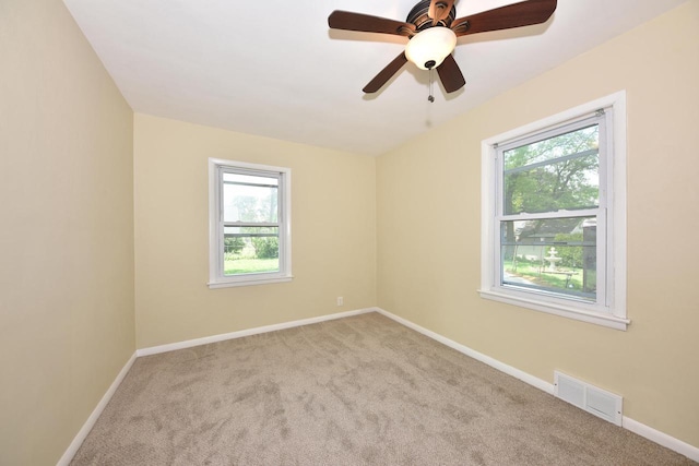 3825 S 5th St Unit 3823, Milwaukee, WI 53207 - empty room featuring healthy amount of natural light, carpet floors, baseboards, and ceiling fan