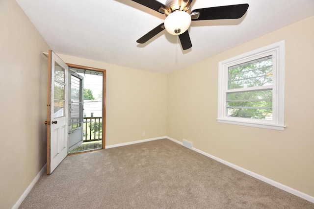 3825 S 5th St Unit 3823, Milwaukee, WI 53207 - empty room with healthy amount of natural light, carpet flooring, and baseboards