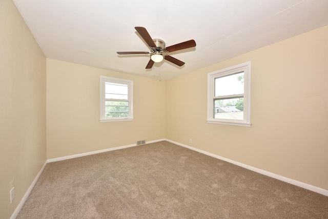 3825 S 5th St Unit 3823, Milwaukee, WI 53207 - empty room with carpet floors, baseboards, and ceiling fan