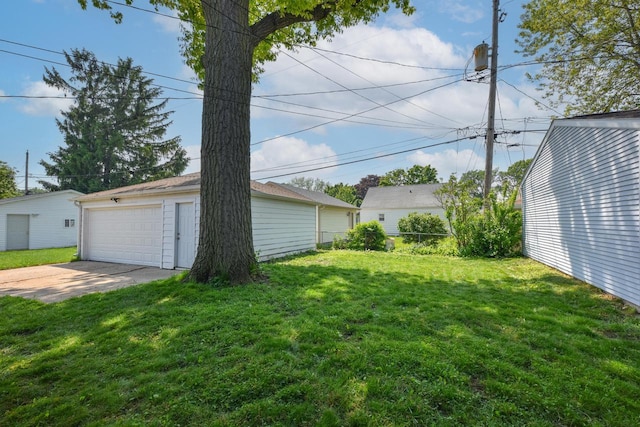 3825 S 5th St Unit 3823, Milwaukee, WI 53207 - view of yard featuring an outdoor structure and a detached garage