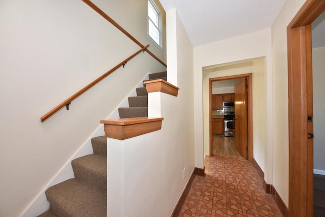 3825 S 5th St Unit 3823, Milwaukee, WI 53207 - staircase featuring baseboards