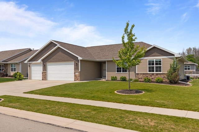 W6008 Zach St, Menasha, WI 54952 - view of front of house with stone siding, a garage, concrete driveway, and a front yard