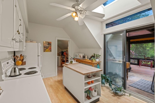 2937 N Mill Rd, Oconomowoc, WI 53066 - kitchen featuring white appliances, open shelves, white cabinetry, butcher block countertops, and vaulted ceiling