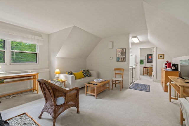 2937 N Mill Rd, Oconomowoc, WI 53066 - living room with light colored carpet and lofted ceiling