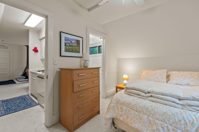 2937 N Mill Rd, Oconomowoc, WI 53066 - bedroom with light colored carpet, lofted ceiling, attic access, and baseboards